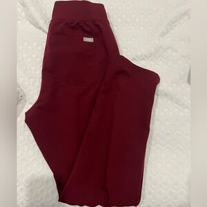 FIGS maroon skinny high waisted yola pants. Size medium